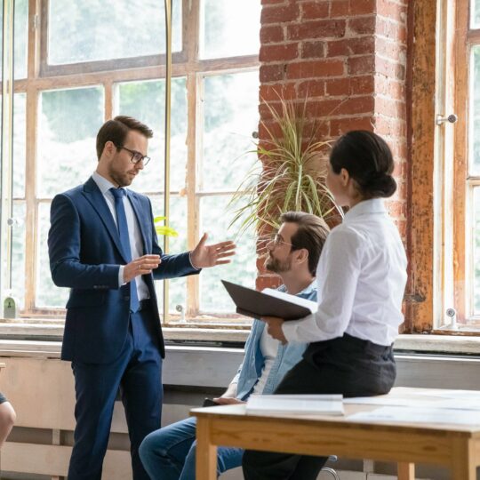 Coach working with public speakers